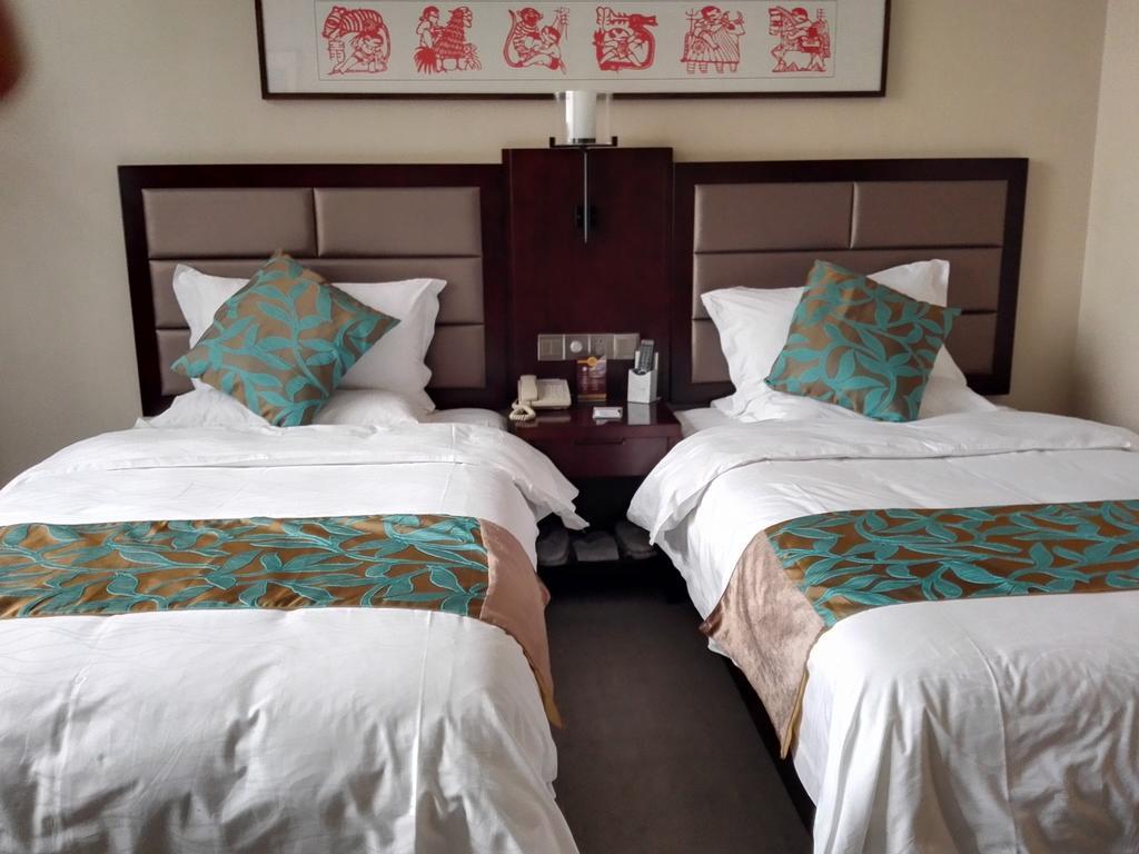 Shanxi Quanjin Business Hotel Taiyuán Habitación foto